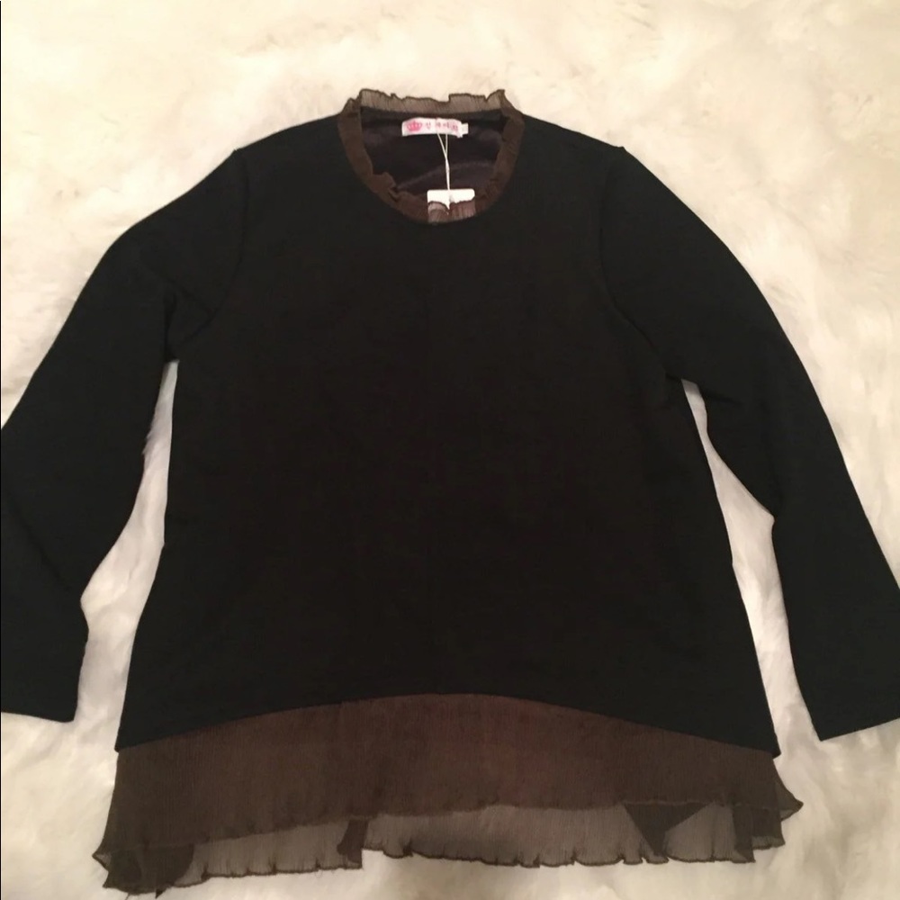 Adorable black top with brown sheer ruffle
